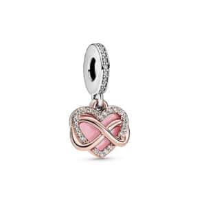 Srebrna zawieszka typu beads z różowym sercem i znakiem nieskończoności. Zawieszka zdobiona cyrkoniami.