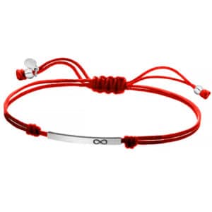 Srebrna bransoletka na czerwonym, podwójnym sznurku z blaszką ze znakiem nieskończoności.